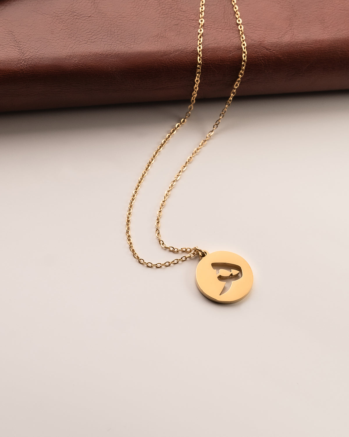 Initial Necklace ھ